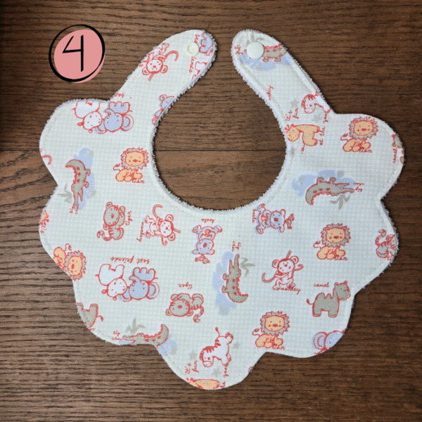 Lot de 2 bavoirs bébé 0-12 mois (motifs à choisir)